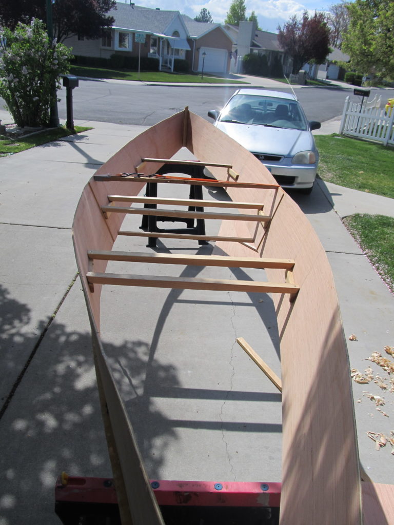 The seat frames are now mostly installed. They aren't fitted well enough to use them as handles, but they should hold the boat in the right shape.